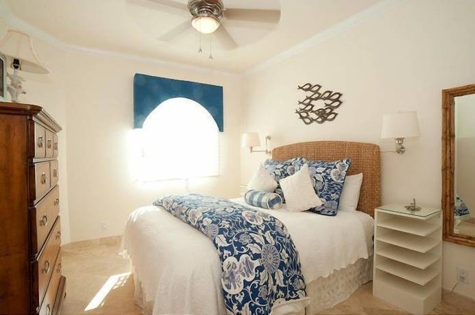Imagen de la habitación del Hotel The Tuscany on Grace Bay. Foto 8
