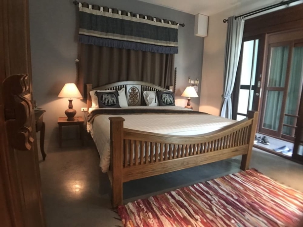 Imagen de la habitación del Hotel The Twenty Lodge. Foto 8