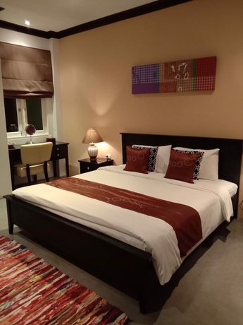 Imagen de la habitación del Hotel The Twenty Lodge. Foto 18