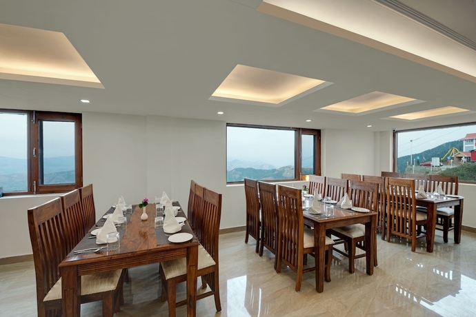 Imagen del bar/restaurante del Hotel The Twin Towers New Kufri. Foto 5