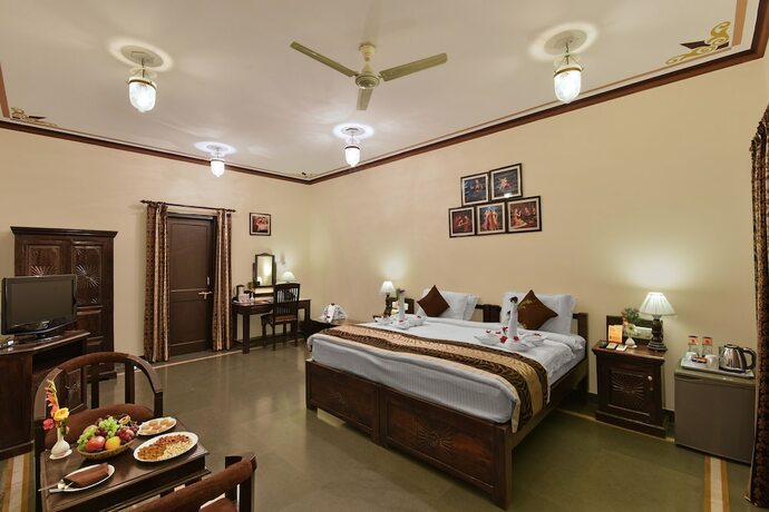 Imagen de la habitación del Hotel The Udai Bagh. Foto 18