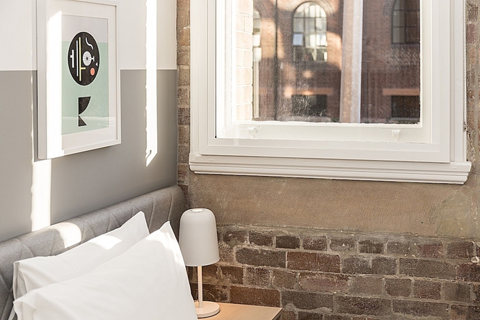 Imagen de la habitación del Hotel The Ultimo. Foto 2