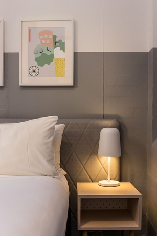 Imagen de la habitación del Hotel The Ultimo. Foto 5