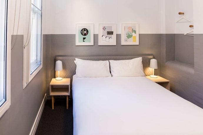 Imagen de la habitación del Hotel The Ultimo. Foto 15