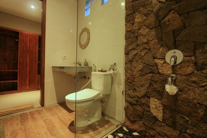 Imagen de la habitación del Hotel The Umari. Foto 3