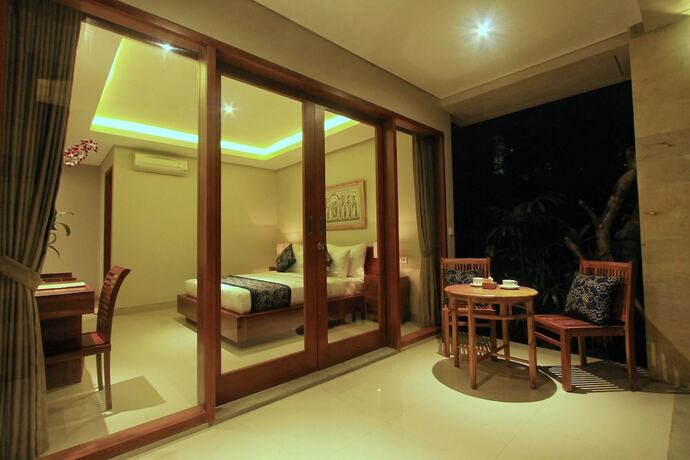 Imagen de la habitación del Hotel The Umari. Foto 5
