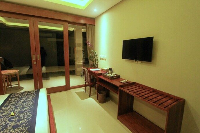 Imagen de la habitación del Hotel The Umari. Foto 6