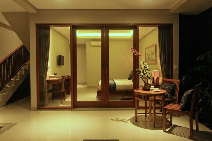 Imagen de la habitación del Hotel The Umari. Foto 7