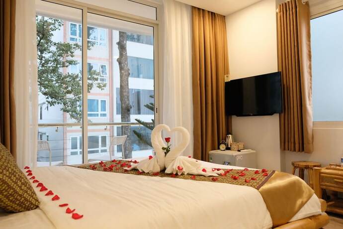 Imagen de la habitación del Hotel The Umi. Foto 13