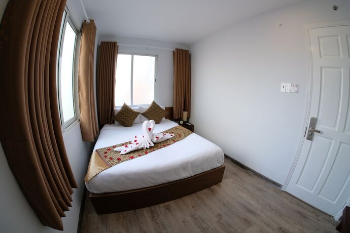 Imagen de la habitación del Hotel The Umi. Foto 16