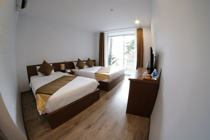 Imagen de la habitación del Hotel The Umi. Foto 18