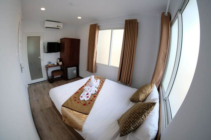 Imagen de la habitación del Hotel The Umi. Foto 22