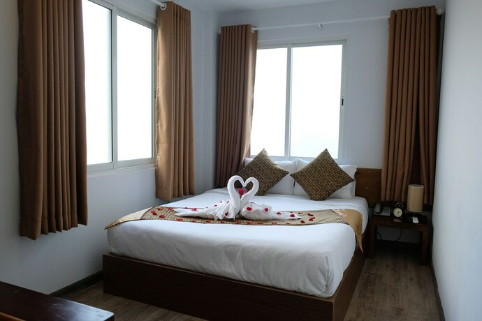 Imagen de la habitación del Hotel The Umi. Foto 23