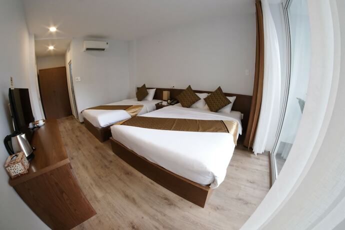 Imagen de la habitación del Hotel The Umi. Foto 25