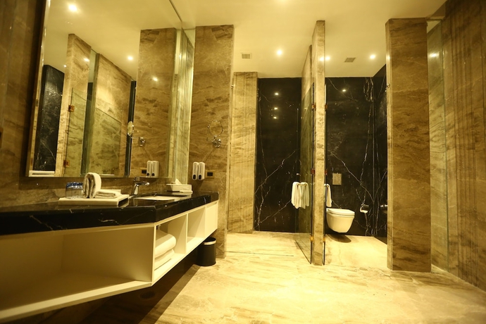 Imagen de la habitación del Hotel The Umrao. Foto 5