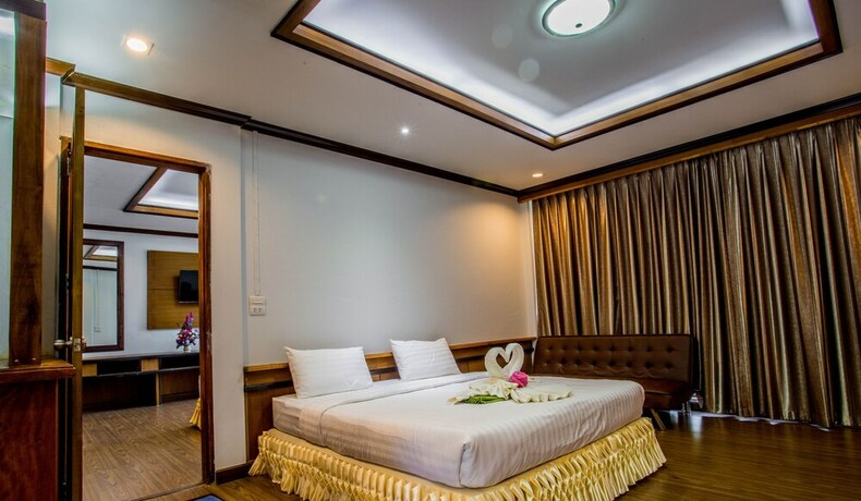 Imagen de la habitación del Hotel The Uncle Beach Resort. Foto 11