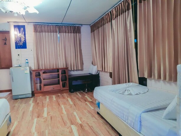 Imagen de la habitación del Hotel The Uncle Beach Resort. Foto 25