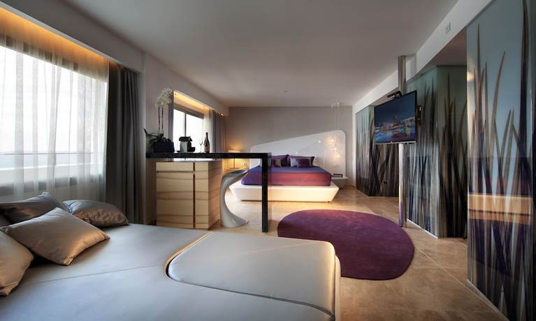 Imagen de la habitación del Hotel The Unexpected Ibiza. Foto 7