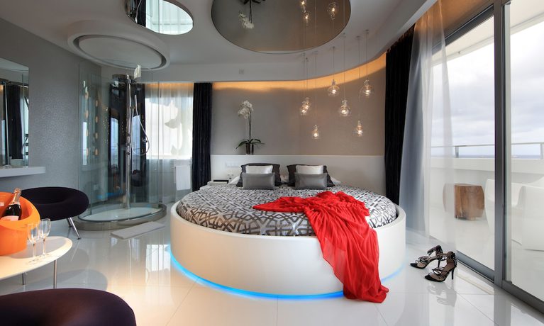 Imagen de la habitación del Hotel The Unexpected Ibiza. Foto 15