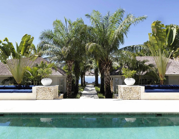 Imagen de la piscina del Hotel The Ungasan Clifftop Resort. Foto 9