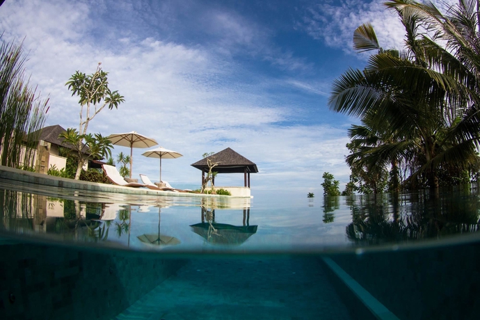 Imagen de la piscina del Hotel The Ungasan Clifftop Resort. Foto 15