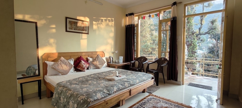 Imagen de la habitación del Hotel The Unmad. Foto 3