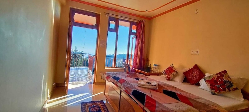 Imagen de la habitación del Hotel The Unmad. Foto 6