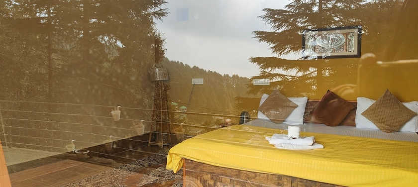 Imagen de la habitación del Hotel The Unmad. Foto 13