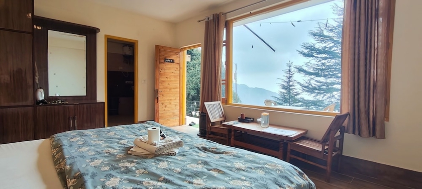 Imagen de la habitación del Hotel The Unmad. Foto 18