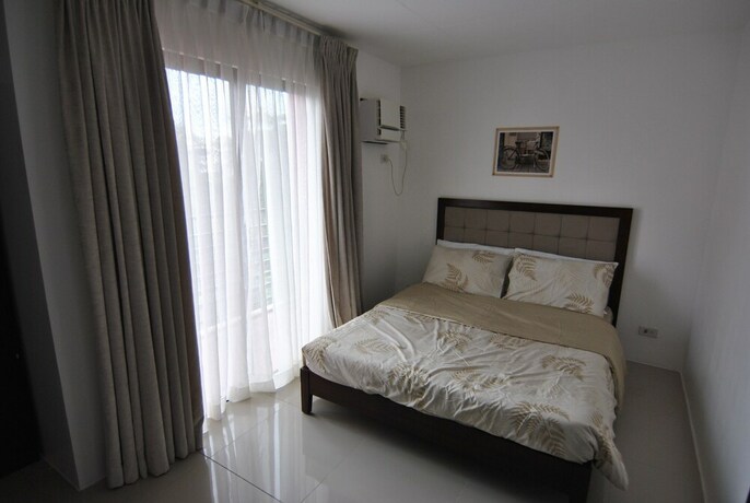 Imagen de la habitación del Hotel The Uptown Place. Foto 16
