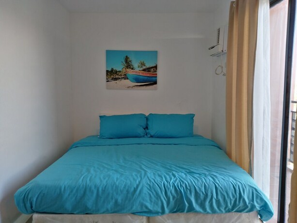 Imagen de la habitación del Hotel The Uptown Place. Foto 17