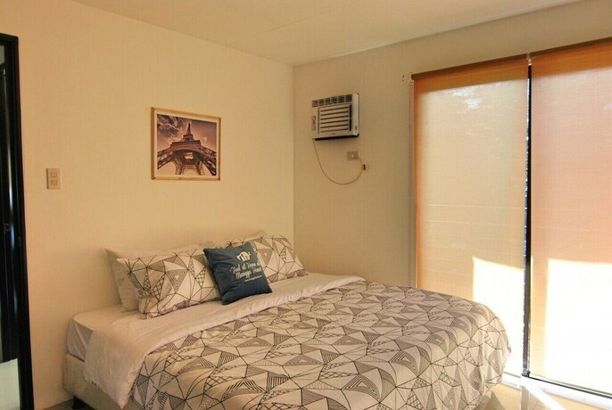 Imagen de la habitación del Hotel The Uptown Place. Foto 18