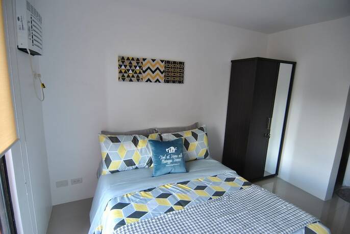 Imagen de la habitación del Hotel The Uptown Place. Foto 19