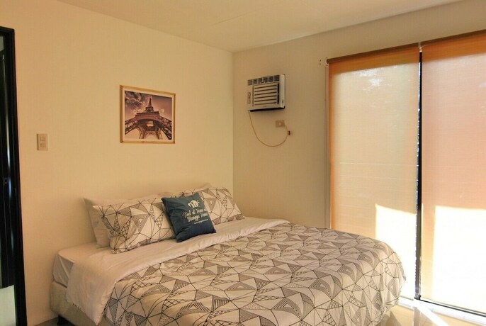 Imagen de la habitación del Hotel The Uptown Place. Foto 24
