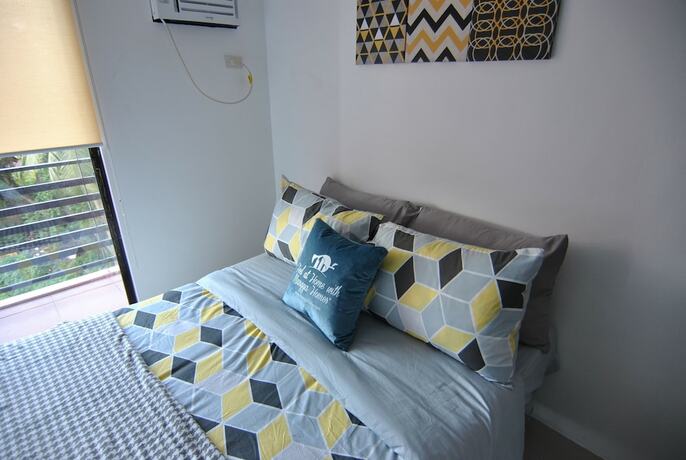 Imagen de la habitación del Hotel The Uptown Place. Foto 26