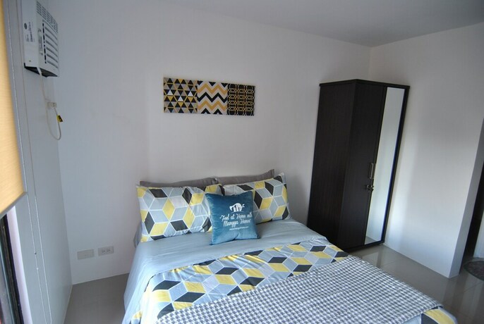 Imagen de la habitación del Hotel The Uptown Place. Foto 27