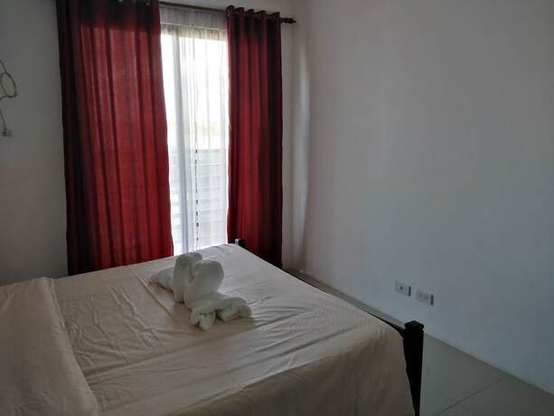 Imagen de la habitación del Hotel The Uptown Place. Foto 31