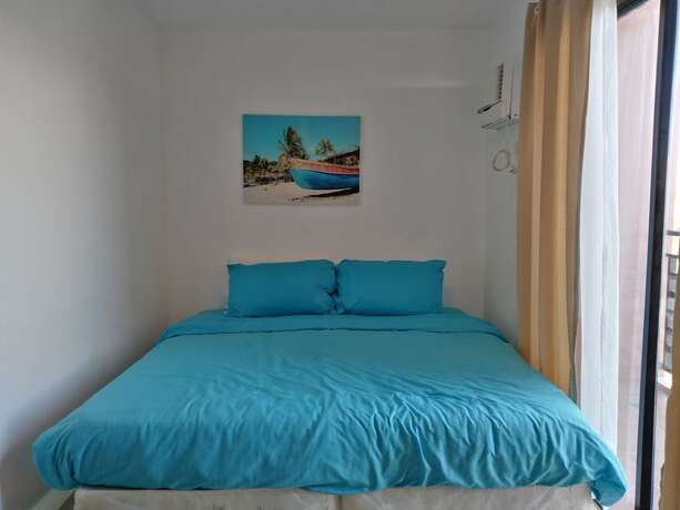 Imagen de la habitación del Hotel The Uptown Place. Foto 32
