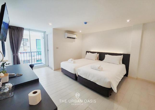 Imagen de la habitación del Hotel The Urban Oasis Bangkok. Foto 6