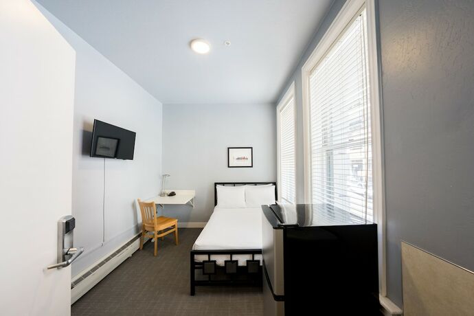 Imagen de la habitación del Hotel The Urban, San Francisco. Foto 18