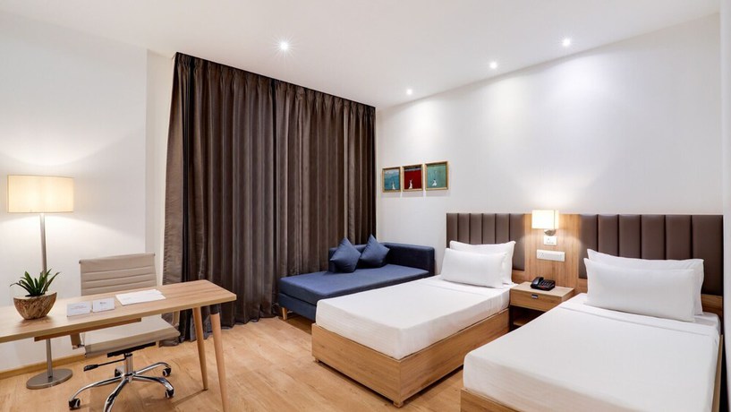 Imagen de la habitación del Hotel The Urban Suites. Foto 2