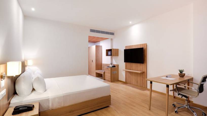 Imagen de la habitación del Hotel The Urban Suites. Foto 5