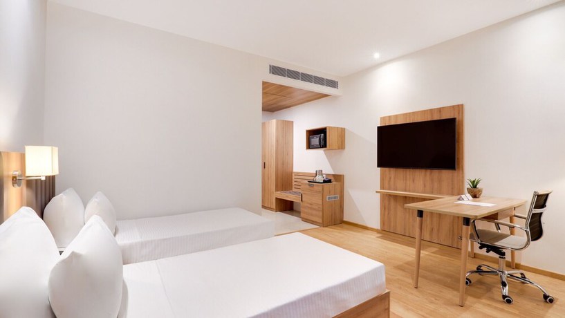 Imagen de la habitación del Hotel The Urban Suites. Foto 10