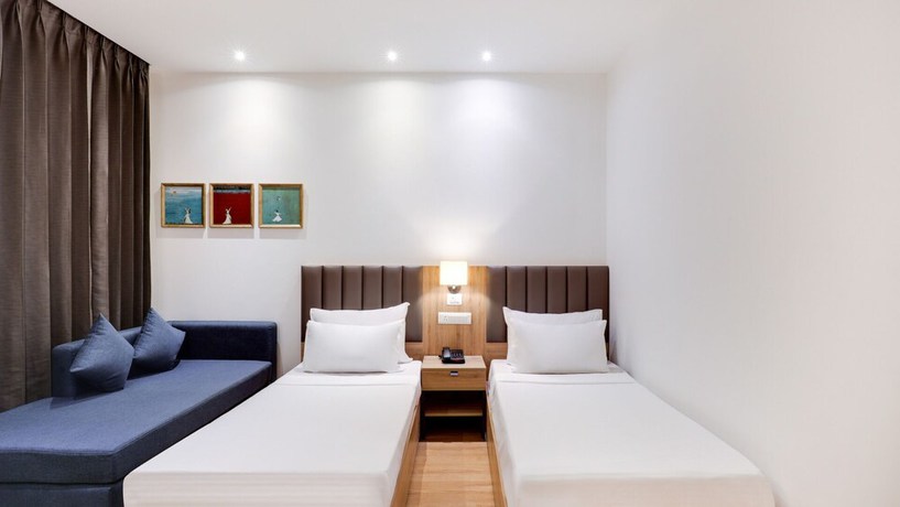 Imagen de la habitación del Hotel The Urban Suites. Foto 12