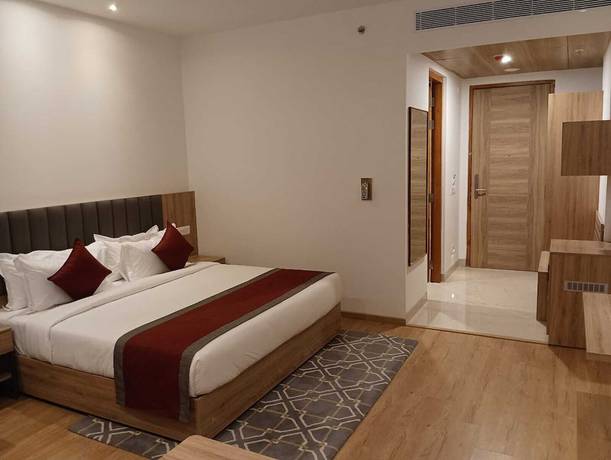 Imagen de la habitación del Hotel The Urban Suites. Foto 16
