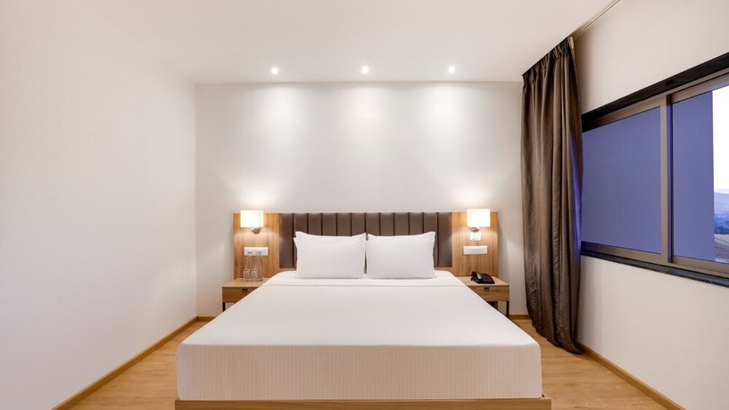 Imagen de la habitación del Hotel The Urban Suites. Foto 17