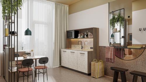 Imagen de la habitación del Hotel The Usual Rotterdam. Foto 6