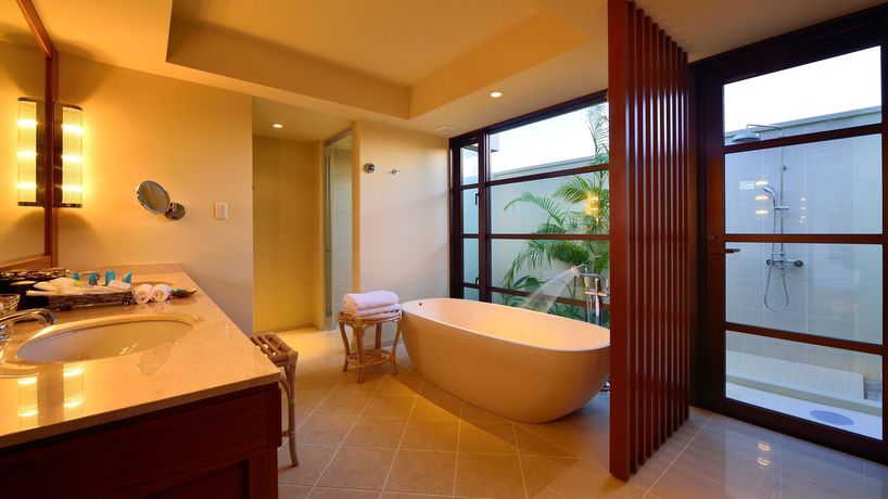 Imagen de la habitación del Hotel The Uza Terrace Beach Club Villas. Foto 5