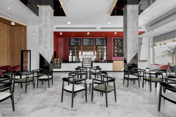 Imagen del bar/restaurante del Hotel The V Luxury Resort Sahl Hasheesh. Foto 3