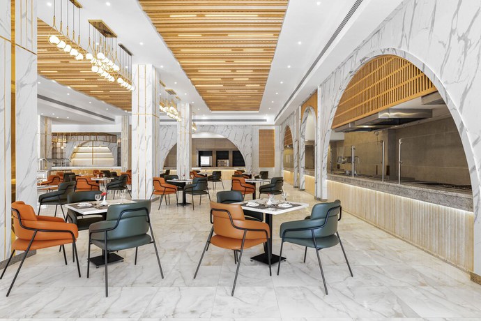 Imagen del bar/restaurante del Hotel The V Luxury Resort Sahl Hasheesh. Foto 6